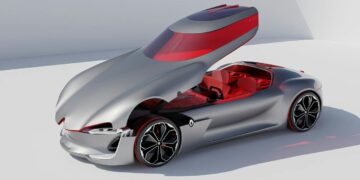 Mobil perak dengan interior merah di permukaan putih